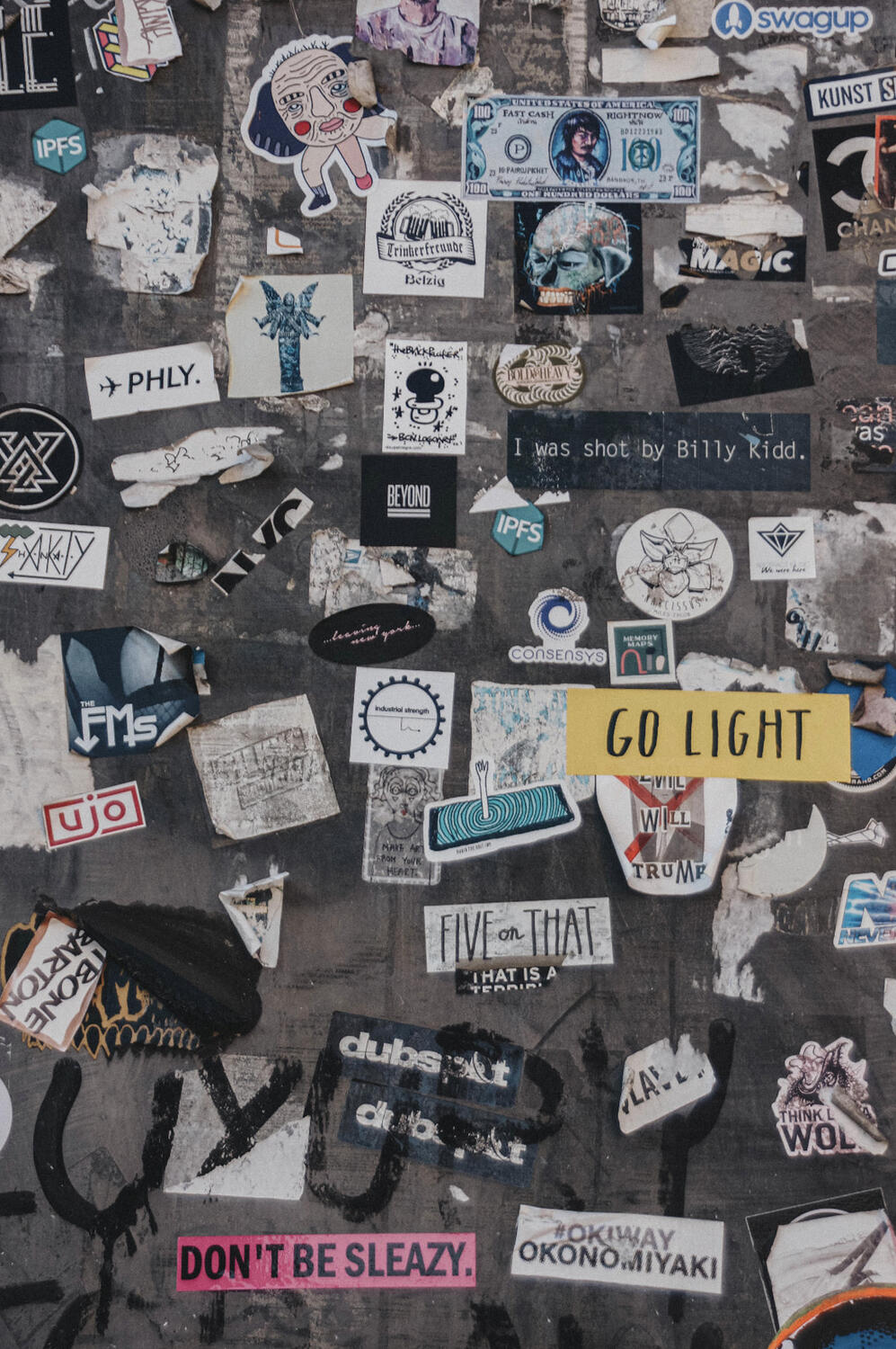 Detail of a sticker-covered wall