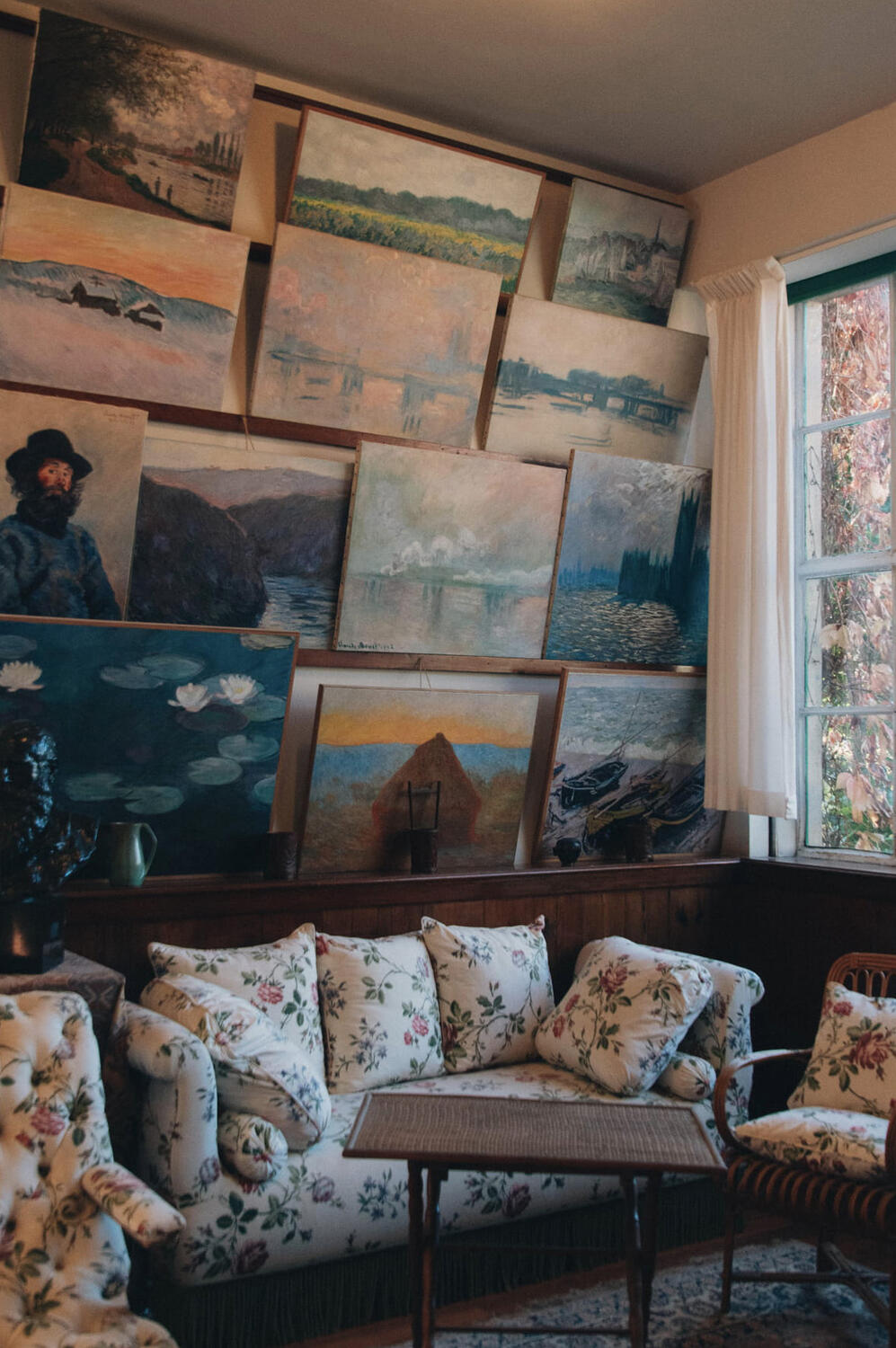 View on several paintings in a living room from Monet's house